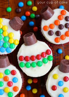 some cupcakes are decorated with candy