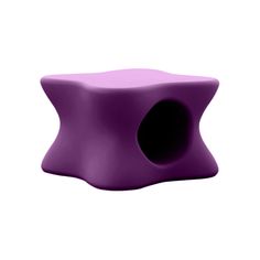 a small purple object sitting on top of a white surface