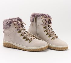 Hit the trails in these suede hiker boots that are all about foot-cradling comfort. A suede exterior combines with cushioned interior -- and faux fur details are thrown in for all the warm fuzzies! From Muk Luks.