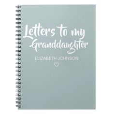 a spiral notebook with the words, letters to my granddaughter written in white on it