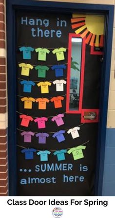 a classroom door decorated with t - shirts and the words hang in there summer is almost here