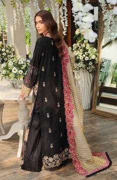 Embroidered Black Salwar Kameez Pakistani Eid Dress is a breathtaking choice to have a charismatic appearance on the big day. This stunning Pakistani Salwar Kameez is adorned with lavish floral designs and embroidery work, making it your foremost priority for Eid day. Kameez: Beautiful Lawn Kameez in the black shade is a perfectly stitched attire to wear on Eid. This Black Kameez is adorned with fine details of embroidery, threads, and beads. Ravishing floral designs and different colors on the Black Lawn Suit With Resham Embroidery For Eid, Black Fitted Lawn Suit With Resham Embroidery, Black Embroidered Georgette Lawn Suit, Black Kameez, Black Semi-stitched Lawn Suit With Intricate Embroidery, Black Salwar, Black Salwar Kameez, Semi-stitched Resham Embroidered Lawn Suit, Salwar Kameez Pakistani