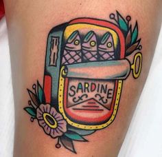 this is an image of someone's thigh with tattoos on it that says sardine sauces