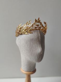 "This crown is an absolute favourite! Made of beautifully detailed leaves accents, this crown is perfect for a stylish bohemian bride or an ethereal garden wedding. - Features brass leaves with beautiful leaf detailing - Hand wired to a metal headband - Available in gold, white and silver - This item is \"Made to Order\" with the creation time of 1weeks plus shipping times - Rush processing times are often available if needed. Please message me with the style name, colour, and wear date and your location for further information" Laurel Leaf Crown, Ethereal Garden Wedding, Pearl Tiara Wedding, Gold Flower Crown, Gold Bridal Tiara, Gold Leaf Crown, Leaf Tiara, Ethereal Garden, Tiara Flower