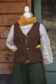 The Villager is inspired by old world utility, with a longing for simpler times. The Villager is perfect for hikes, homesteading and alleluias. Handcrafted to last and to feel both beautiful and durable.  The Villager is a boiled wool vest with a linen interior.  It has a regular fit and hits at upper hip.  The Villager is a gender neutral garment.  If you don't see your size here, please contact me with your measurements for a custom fit.  Size Chart: X Small - 31" bust Small - 33" bust Medium Burnsville Nc, Linen Vest, Linen Interior, Simpler Times, Utility Vest, Wool Vest, Boiled Wool, Vest Outfits, Womens Vest