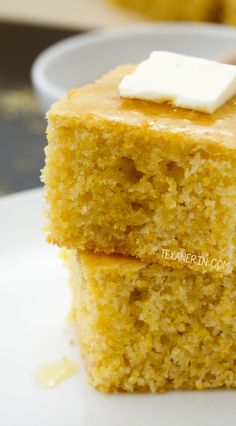 two pieces of cake on a white plate