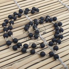 📿Karungali (black ebony wood) is a very powerful tree which our ancestors used. It was used in ancient temples and temple towers (kalasam); was also used in significant homams and other pooja rituals. Ebony Wood Mala is here to remind us to be current and clear-headed so we can make wise and informed decisions. We are being asked to seek new ways to create beauty and harmony that are sustainable for the long-term. This is a time to bring clarity to our intentions as we focus on the future.📿 ✨ Black Wooden Beads For Meditation, Black Wooden Beads For Jewelry Making, Traditional Black Necklace With 8mm Beads, Tibetan Mala, Buddhist Mala, Silk Gifts, Mala Meditation, Wood Bead Necklace, Ancient Temples