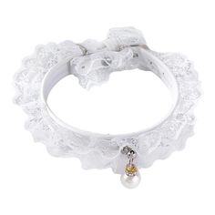 a white bracelet with pearls and bows