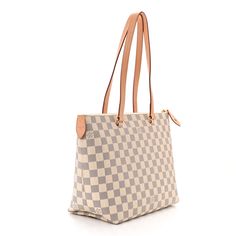 This is an authentic LOUIS VUITTON Damier Azur Iena PM. This stylish tote is crafted of Louis Vuitton checkerboard coated canvas in blue and white with vachetta leather accents. The bag features vachetta leather shoulder straps and a front zippered pocket. The top zipper opens to a light pink fabric interior with patch pockets. Light Pink Fabric, Louis Vuitton Damier Azur, Leather Accents, Pink Fabric, Authentic Louis Vuitton, Louis Vuitton Damier, Shoulder Straps, Patch Pocket, Zipper Pocket