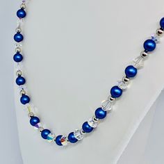 All Swarovski Beads . Sapphire Blue Pearls Crystal Ab Beads And Finished With A Sterling Silver Lobster Clasp . Brand New Blue Single Strand Beaded Necklace For Wedding, Blue Single Strand Wedding Necklace, Blue Beaded Crystal Necklace, Blue Beaded Chain Jewelry For Wedding, Blue Crystal Round Bead Jewelry, Blue Crystal Round Beads Jewelry, Blue Crystal Round Beaded Jewelry, Blue Crystal Beaded Necklaces For Jewelry Making, Elegant Blue Crystal Necklaces With Round Beads