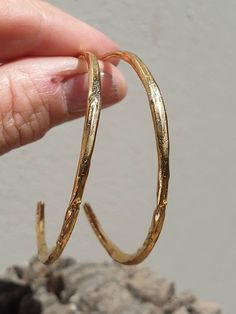 These sre gold light hoop earrings. They are Large handmade hammered hoop earrings. The earrings are hand forged textured earrings with Classic simple minimalist design. These are gold plated earrings that can be a great gift for women and teens. Great present for the holidays or for yourself.. Simple and beautiful, these hoops are perfect for everyday wear. They are made from the highest quality 14K Gold fill, gold plated brass or Sterling Silver. Each pair comes with 6 pairs of silicone stoppe Hammered Hoop Earrings For Gift, Gold Electroformed Hoop Earrings, Textured Earrings, Hoop Earrings Large, Earrings Classic, Hammered Hoop Earrings, Great Gifts For Women, Earrings Large, Simple Valentine