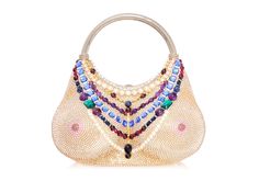 In celebration of the woman's body, this bag is reminiscent of the ethereal feminine quality of Boticelli’s Venus. Our Nude Bust crystal handbag captivates with a collage of layered necklaces adorned with pearls, semi-precious stones and gems in sapphire, amethyst, ruby, and emerald with fancy flat back crystals arranged to create a breathtaking visual symphony. split  Crystal adorned novelty handbag Metallic leather lined interior Polished push down closure Silver toned metal hardware Removable jewel station and pearl station shoulder chain Judith Leiber Couture Collector's Edition Nameplate  Made in Italy  Dimensions: 3" L x 6.5" H x 3" D Chain Length: 40" / Handle drop 19" Style Number: M202703 Judith Leiber Bags, Novelty Handbags, Fancy Purses, Crystal Handbag, Fancy Flats, Judith Leiber Couture, Unique Purses, Judith Leiber, Shoulder Chain