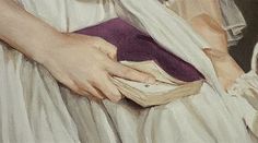 a painting of a woman's hands holding a book