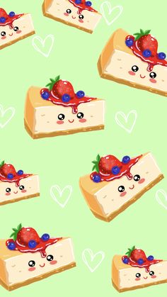 slices of cheesecake with strawberries and blueberries on top are arranged in the shape of hearts