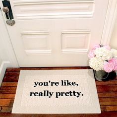 a door mat that says you're like, really pretty