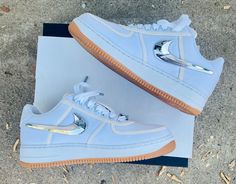 Worn only a few times, casually indoors. No Creasing or stains. Almost perfect- 9.5 US Nike Air Force 1 Low Travis Scott AF100 is a special release of the Air Force 1 released in collaboration with rapper Travis Scott as part of the AF100 collection celebrating 35 years of the silhouette. This pair is a white canvas upper and gum rubber outsole. Comes with all OG extras- Swoosh that comes in different colors, a Velcro stash pocket on the inside of the tongue and an inverted Nike Air logo. The Nike Air Force 1 Low Travis Scott AF100 was released for retail on December 2, 2017 at the price of $150. I purchased this pair myself at Maxfield LA. OG box with price tag included.    ADDITIONAL LISTING NOTES: Please review ALL pictures before purchasing. TRAVIS SCOTT BRANDED BOARD  VELCRO SWOOSH PA Air Force 1 Travis Scott, Rapper Travis Scott, Air Logo, Almost Perfect, Air Force 1 Low, Travis Scott, White Canvas, Nike Air Force 1, Price Tag