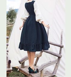 Vintage-inspired Dark Academia Dress with long flared sleeves, lace-up front and ruffles. S Bust: 84cm Waist: 66cm Length: 106cm M Bust: 88cm Waist: 70cm Length: 107cm L Bust: 92cm Waist: 74cm Length: 108cm XL Bust: 96cm Waist: 78cm Length: 109cm Gothic Cotton Dress With Ruffles, Cotton Victorian Long Sleeve Dress For Fall, Long Sleeve Cotton Dress For Cosplay, Long Sleeve Cotton Victorian Dress For Fall, Fall Victorian Long Sleeve Cotton Dress, Cotton Long Sleeve Victorian Cottagecore Dress, Cottagecore Vintage Dress With Ruffles For Fall, Cottagecore Vintage Ruffled Dress For Fall, Cotton Victorian Dress With Long Sleeves In Cottagecore Style