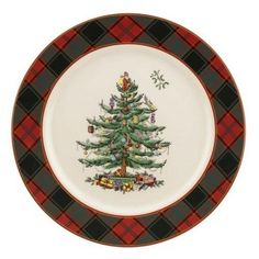 a plate with a christmas tree painted on the front and bottom, decorated with plaid