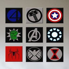 the avengers symbols are displayed on the wall