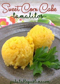 sweet corn cake tamales on a plate with parsley