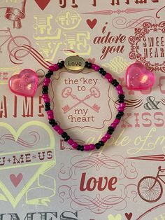 This is a Valentine Love bracelet. It would make a great gift for a teen girl for Valentines Day. You can wear this bracelet every day not just for Valentines Day. It would make a great Birthday gift for a teen girl. It has a silver love bead in the middle. It has hot pink and black seed beads. It was made with .8mm sturdy stretch string. I tie it several times to prevent breakage. It fits most teen girls. It stretches to fit on the wrist. All items are ready to be shipped I do combined shipping. Items ship in 2-5 business days. Check out more items at: http://www.etsy.com/shop/MesheleCrafts Gifts For Valentines, Bracelet Love, Seed Bead Bracelet, Valentine Love, Love Bracelet, Key To My Heart, Black Seed, Great Birthday Gifts, Seed Bead Bracelets