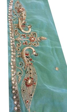 an elaborately designed piece of cloth with beads on it