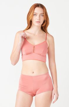 You can expect both comfort and support in our signature bralette --so comfortable, you can even sleep in it. Our brilliant, solid colors are made from a high grade, venezia fabric that acts as a second skin. Finally, a bra that really works without underwire! The straps adjust and are made of 1/2" elastic that won't dig into your shoulders after a long day. Ethically made in USA Venezia: 95 % Polyester / 5% lycra blend. Machine wash cold delicate, line dry. Mauve Color, Nude Color, Coral Color, Second Skin, Beige Color, Body Types, High Grade, Polyester Spandex, Bralette