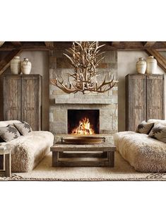 a living room with two couches and a fire place in the middle of it