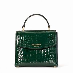 Material: Croc-Embossed Leather, Faille Lining Top-Handle With Push-Lock Flap Closure Interior Slip Pocket Interior Card Slots Exterior Slip Pocket Color: Evergreen Removable Crossbody Strap Dimensions: 5.9"H X 7.1"W X 3.5"D Handle Drop: 2.5" Strap Drop: 22" Green Purse, Bag Designs, Mini Handbags, Happy Camper, Happy Campers, Hand Bags, Kate Spade Bag, Crossbody Strap, Embossed Leather