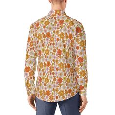 Embark on a journey to the free-spirited era of the 70s with our Vintage 70s Style Shirt, a Retro Shirt meticulously designed for the modern man who appreciates the timeless charm of hippie fashion. This Hippie Shirt for Men boasts a vibrant floral pattern in orange, pink, white, and yellow hues, capturing the eclectic and carefree style of the 70s. Ideal as a Men's Dress Shirt, this 70s Inspired Shirt effortlessly infuses your wardrobe with retro charm.Whether you're attending a special event o Cotton Shirt With Retro Print In Relaxed Fit, Fitted Orange Printed Shirt, Casual Shirt With Retro Print For Spring, Spring Casual Shirt With Retro Print, Casual Retro Print Shirt For Spring, Retro Orange Relaxed Fit Shirt, Orange Retro Style Relaxed Fit Shirt, Hippie Long Sleeve Summer Shirt, 70s Inspired Cotton Summer Tops