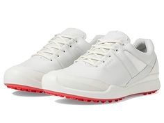 ECCO Golf Biom Golf Hybrid Hydromax Golf Shoes - Women's Shoes : White/White Cow Leather/Synthetic : Leather sourced from a tannery that achieved a Gold Rating from the Leather Working Group (LWG). Sleek, understated and fashioned from a fresh mix of durable ECCO leather and premium textiles, the ECCO W GOLF BIOM HYBRID offers contemporary street style for on and off the course. In wet weather, the water-repellent ECCO HYDROMAX technology will help to keep your foot dry. Engineered with BIOM NAT White Synthetic Lace-up Golf Shoes, Functional Low-top Synthetic Golf Shoes, Leather Golf Shoes, Sporty Style, Leather Sporty Golf Shoes, Functional Golf Shoes For Light Sports, White Leather Training Sneakers, White Synthetic Golf Shoes, White Leather Golf Shoes, White Golf Shoes With Boost Midsole