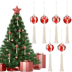 a christmas tree decorated with red and white balls, tassels and ornaments next to presents