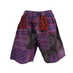 Unisex handsewn patchwork shorts made in Nepal. These high quality shorts are thicker and more durable than your standard cotton shorts. Features:  - As these are handmade the locations of the patches may vary. However, the general colour will remain the same. - Elastic waist with a draw string - 2 side pockets - 1 back pocket Sizes:  *As these are handmade these dimensions may vary slightly M: *        Elastic waist: 68-106cm *        Outseam: 51cm *        Inseam: 21cm L: *        Elastic wais Summer Festival Shorts With Patchwork, Bohemian Cotton Shorts, Hippie Patchwork Shorts For Festival, Bohemian Shorts With Pockets, Bohemian Patchwork Shorts, Multicolor Patchwork Cotton Shorts, Purple Cotton Shorts With Pockets, Hippie Multicolor Shorts, Multicolor Hippie Shorts