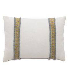 a white pillow with yellow and grey trims on it's sides, against a white background