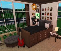 a bedroom with a bed, desk and guitar in it's centerpieces