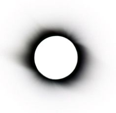 a black and white photo of an object in the sky