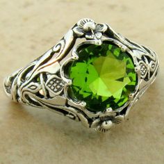 "Vintage Estate 1.50 Carat Green Simulated Peridot \"SCOTTISH THISTLE\" Solitaire Filigree Ring. Intricate Floral Details. 925 Solid Sterling Silver. The Top Of The Ring Measures 1/2 Inch In Length. Stamped 925. Excellent Condition/Like New Ring Sizes 5-10." Scottish Thistle Art, Art Deco Inspired Jewelry, Antique Style Rings, Mystic Quartz, Peridot Stone, Victorian Rings, 925 Ring, Peridot Gemstone, Filigree Design