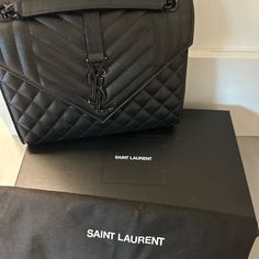 Black Ysl Envelope Bag/ Overall Good Condition There Is Some Ware In The Logo Hardware Ysl Envelope Bag Black, Ysl Envelope Bag, Ysl Envelope, Saint Laurent Bags, Yves Saint Laurent Bags, Bags Black, Envelope Bag, Yves Saint Laurent, Saint Laurent