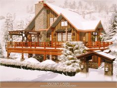 a house in the snow surrounded by trees