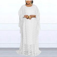 Step into timeless elegance with our MD African Lace Wedding Maxi Dress. This fashion-forward piece seamlessly combines traditional African aesthetics with contemporary style, creating a stunning outfit for your special day. The intricately designed lace adds a touch of sophistication and allure, making it a perfect choice for a sexy and memorable wedding ensemble.Designed with the modern woman in mind, this dress effortlessly fuses comfort and style. The plus-size fit ensures a flattering silho Ceremony Gown With Delicate Lace, Delicate Lace Gown For Ceremonies, Elegant Dresses With Lace Patchwork For Ceremony, Elegant Lace Patchwork Dress For Ceremony, Lace Gown For Mother Of The Bride, Elegant Lace Trim Dress For Ceremony, Elegant Ceremony Dress With Lace Patchwork, White Gown With Scalloped Lace, Floor-length Lace Gown With Scalloped Detail