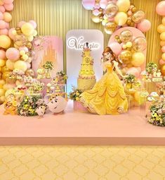 a princess themed birthday party with balloons and cake