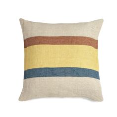 a striped pillow on a white background