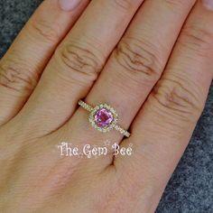 Thank you for coming in! Spectacular petite 14K solid yellow gold ring with 0.6 carat natural pink sapphire cushion center and pave diamond halo(0.25 carat G color, VS-SI clarity). It looks much much nicer in person! SIZE: 6.5 DIMENSION of top: 8.6mm WEIGHT: 0.6 carat sapphire, 0.25 carat diamond, 2.25 Gram total weight MATERIAL: 14K Solid Gold ring, Diamond, Natural Sapphire 5 Dimension, Gold Ring Diamond, Solid Gold Ring, Sky Blue Topaz, Ring Diamond, Natural Sapphire, Diamond Halo, Wow Products, Solid Yellow