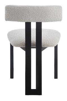 a white chair with black legs and a seat cushion