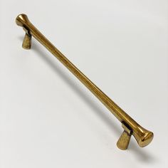 an old brass door handle on a white background