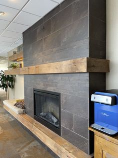 a large fireplace in the middle of a room