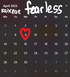 a calendar with the words fearless written on it and a red heart in the middle