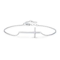 Introducing the MySilverStandard Lucille Cross Bracelet! This beautiful bracelet is crafted from 100% 925 sterling silver, and features a classic cross design. It's perfect for any woman or girl who loves elegant jewelry. The adjustable chain means that it can be worn at any length, making it a versatile piece that can be worn with any outfit. Whether you're dressing up for a special occasion or just wanting to add a touch of class to your everyday look, this bracelet is a must-have. Order yours today! Silver Cross Bracelet, Cross Design, Cross Bracelet, 8th Grade, Cross Designs, Silver Cross, Elegant Jewelry, Beautiful Bracelet, Womens Bracelets