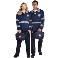 a man and woman dressed in blue work clothes