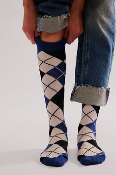 Forever cool and classic, these stand-out socks are featured in a knee-high silhouette with colorful argyle printing throughout for a versatile, vintage-inspired style. **Features:** Knee-high design, soft knit fabrication, contrast heel toe and top hem **Why We ❤ It:** The ideal pair to style with anything from a fun flat to a luxe loafer. | Anna Sui Argyle Socks at Free People in Blue Fun Socks Outfit, Trendy Blue Winter Socks, Blue Knee High Socks, Fun Socks Knee High, Blue Casual Knitted Socks, Argyle Knee High Socks, Argyle Socks, Best Flats, Fun Socks